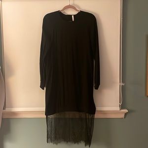 Long sleeve black mini dress with lace detail